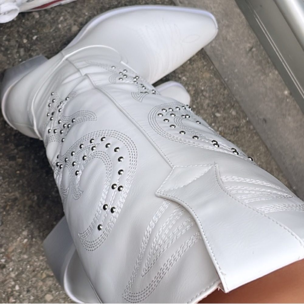 Knee high white cowboy boots